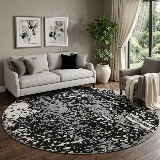 8' Black Gray And Ivory Abstract Washable Round Rug With UV Protection Photo 1