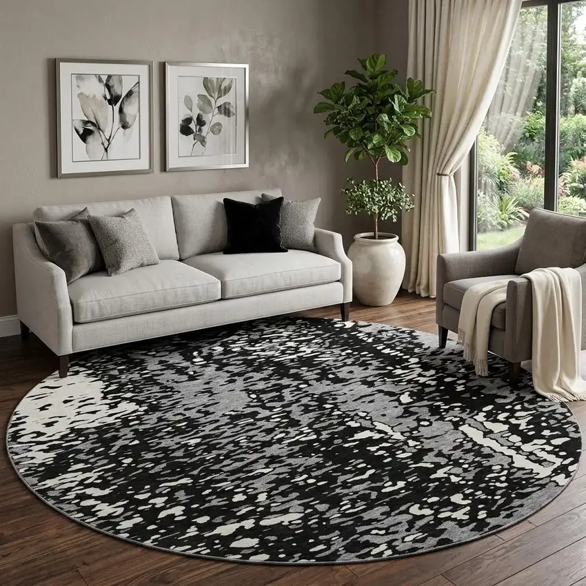 8' Black Gray And Ivory Abstract Washable Round Rug With UV Protection Photo 1