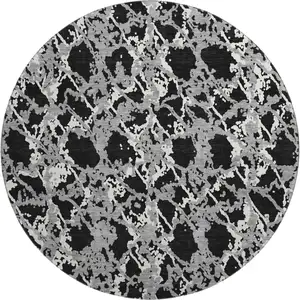 Photo of 8' Black Gray And Ivory Abstract Washable Round Rug With UV Protection