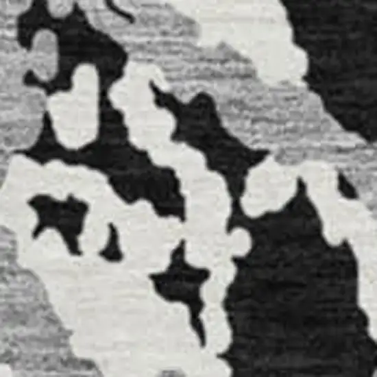 8' Black Gray And Ivory Abstract Washable Round Rug With UV Protection Photo 2