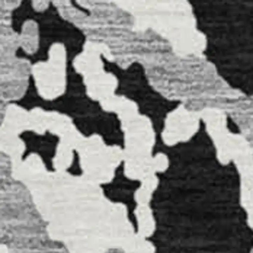 8' Black Gray And Ivory Abstract Washable Round Rug With UV Protection Photo 2