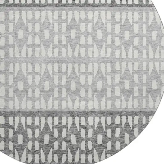 8' Black Gray And Ivory Geometric Washable Round Rug With UV Protection Photo 2