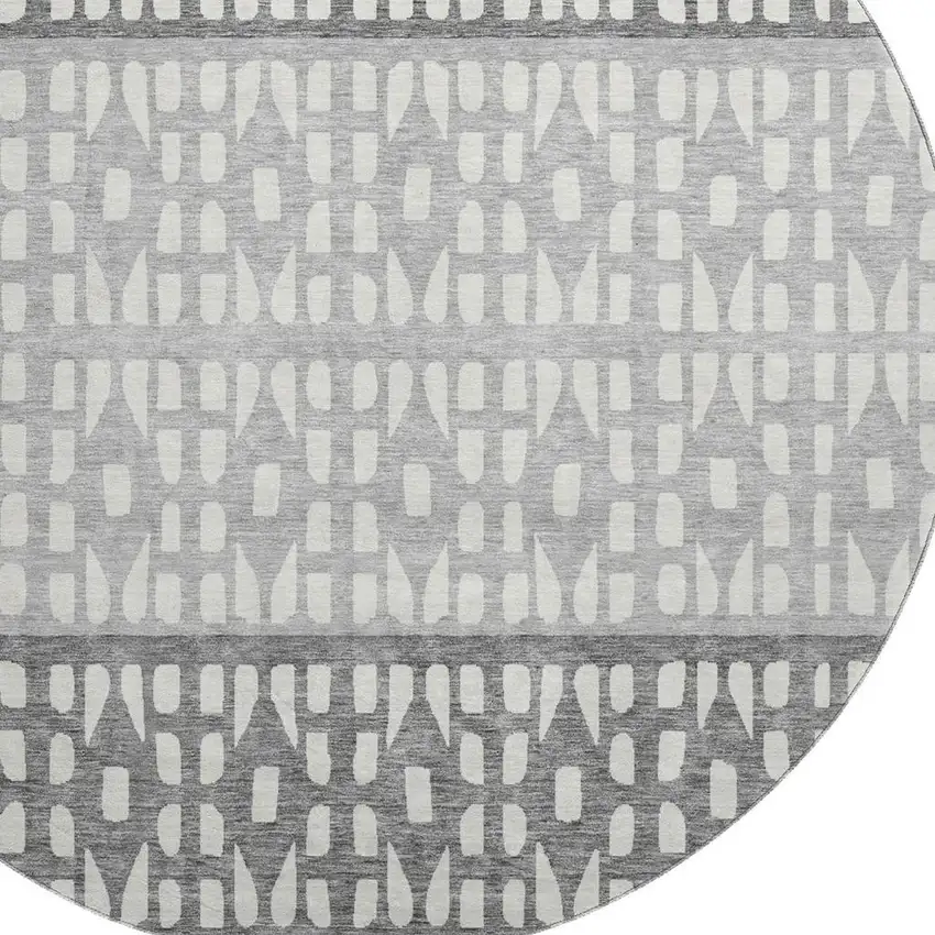 8' Black Gray And Ivory Geometric Washable Round Rug With UV Protection Photo 2