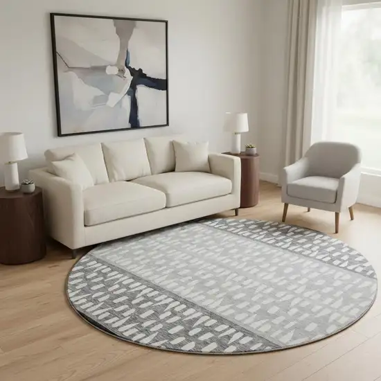 8' Black Gray And Ivory Geometric Washable Round Rug With UV Protection Photo 2