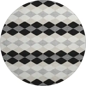 Photo of 8' Black Gray And Ivory Geometric Washable Round Rug With UV Protection