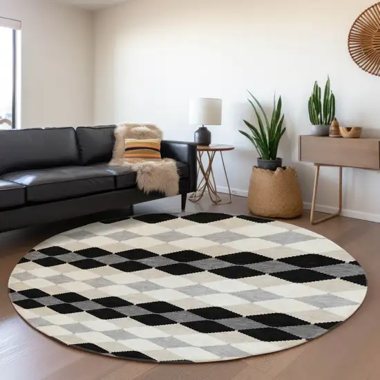 8' Black Gray And Ivory Geometric Washable Round Rug With UV Protection Photo 4