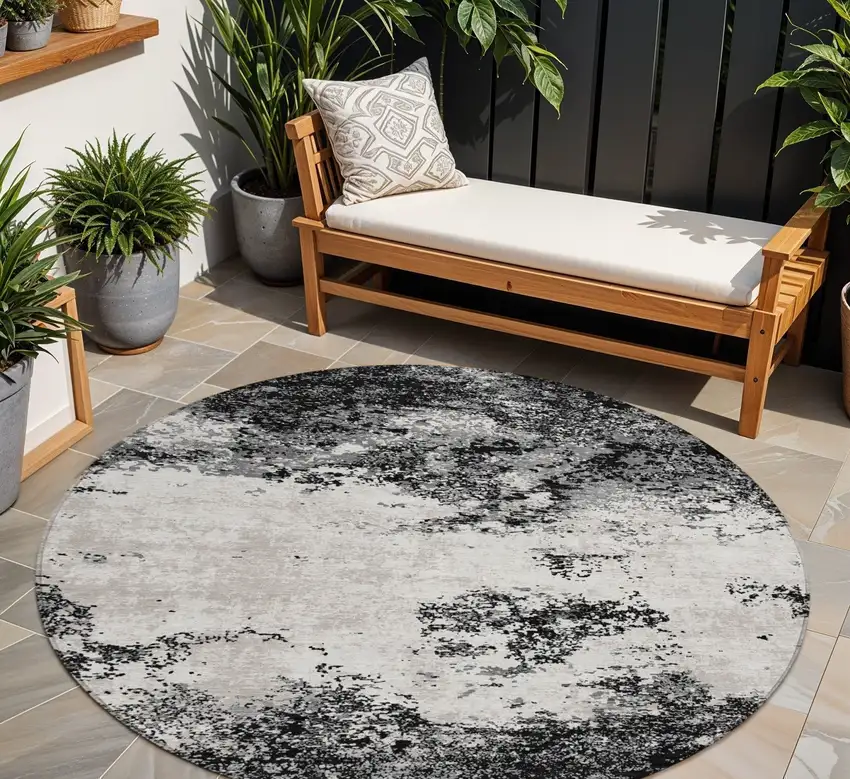 8' Black Gray And Ivory Round Abstract Washable Indoor Outdoor Area Rug Photo 1
