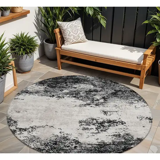 8' Black Gray And Ivory Round Abstract Washable Indoor Outdoor Area Rug Photo 1