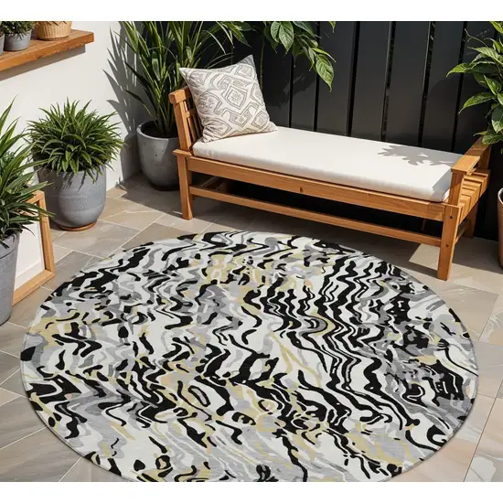 8' Black Gray And Ivory Round Abstract Washable Indoor Outdoor Area Rug Photo 1