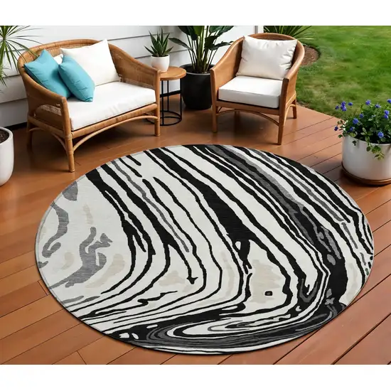 8' Black Gray And Ivory Round Abstract Washable Indoor Outdoor Area Rug Photo 1