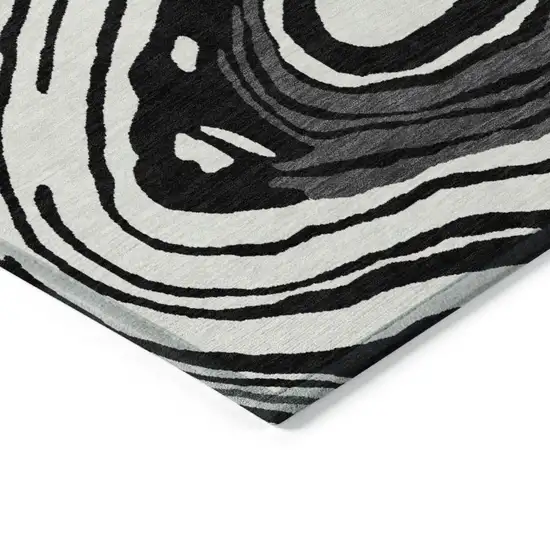 8' Black Gray And Ivory Round Abstract Washable Indoor Outdoor Area Rug Photo 4