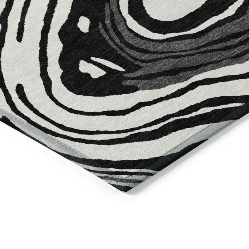 8' Black Gray And Ivory Round Abstract Washable Indoor Outdoor Area Rug Photo 4