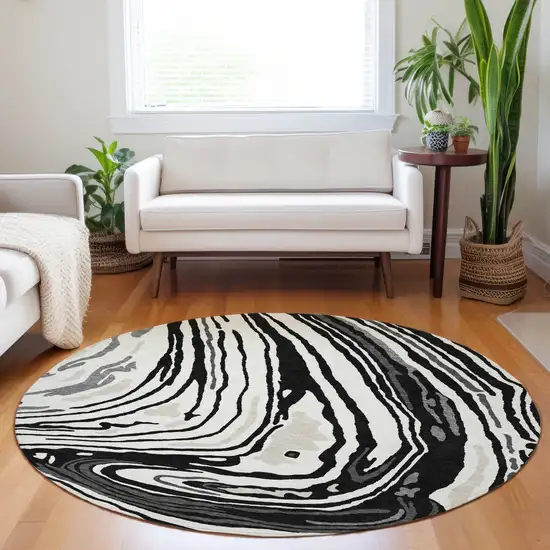 8' Black Gray And Ivory Round Abstract Washable Indoor Outdoor Area Rug Photo 9