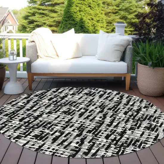 8' Black Gray And Ivory Round Abstract Washable Indoor Outdoor Area Rug Photo 8