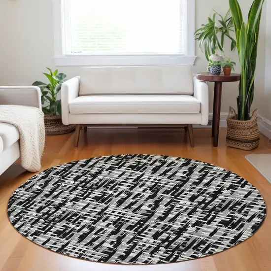 8' Black Gray And Ivory Round Abstract Washable Indoor Outdoor Area Rug Photo 9
