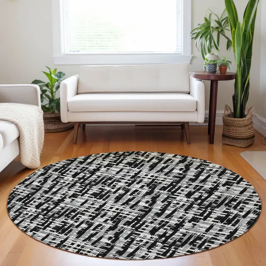8' Black Gray And Ivory Round Abstract Washable Indoor Outdoor Area Rug Photo 9
