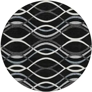 Photo of 8' Black Gray And Ivory Round Abstract Washable Indoor Outdoor Area Rug