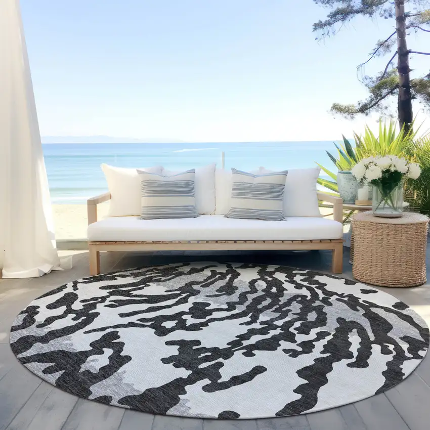 8' Black Gray And Ivory Round Animal Print Washable Indoor Outdoor Area Rug Photo 6