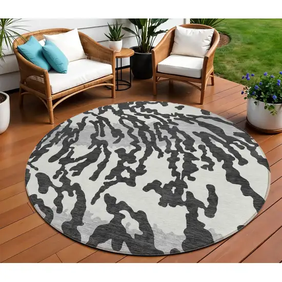 8' Black Gray And Ivory Round Animal Print Washable Indoor Outdoor Area Rug Photo 1