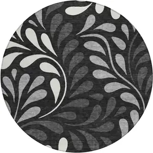 Photo of 8' Black Gray And Ivory Round Botanical Leaves Washable Indoor Outdoor Area Rug