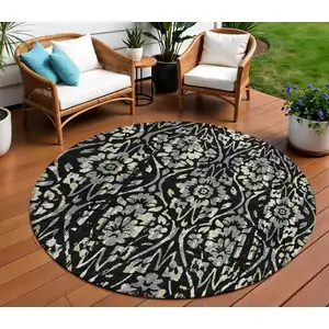 Photo of 8' Black Gray And Ivory Round Floral Washable Indoor Outdoor Area Rug