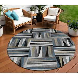 Photo of 8' Black Gray And Ivory Round Geometric Washable Indoor Outdoor Area Rug