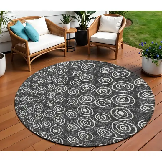 8' Black Gray And Ivory Round Geometric Washable Indoor Outdoor Area Rug Photo 1