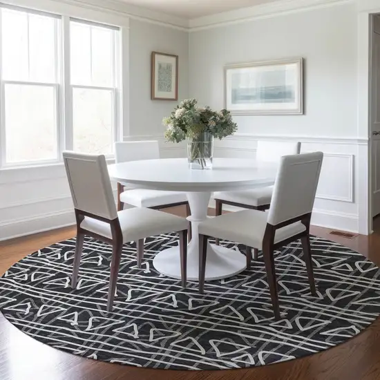 8' Black Gray And Ivory Round Geometric Washable Indoor Outdoor Area Rug Photo 7