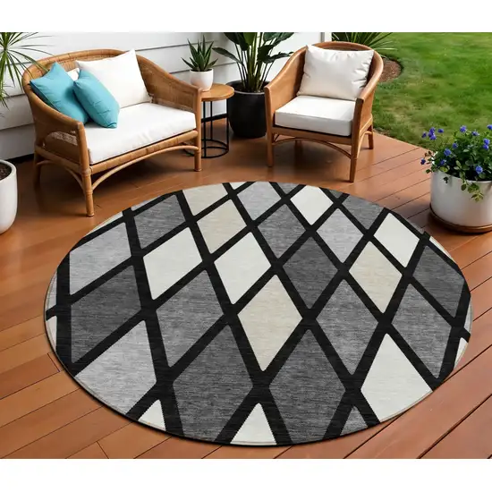 8' Black Gray And Ivory Round Geometric Washable Indoor Outdoor Area Rug Photo 1