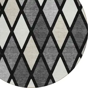 Photo of 8' Black Gray And Ivory Round Geometric Washable Indoor Outdoor Area Rug