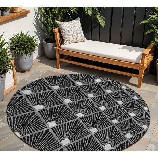 8' Black Gray And Ivory Round Geometric Washable Indoor Outdoor Area Rug Photo 1