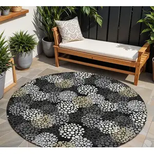 Photo of 8' Black Gray And Ivory Round Polka Dot Washable Indoor Outdoor Area Rug