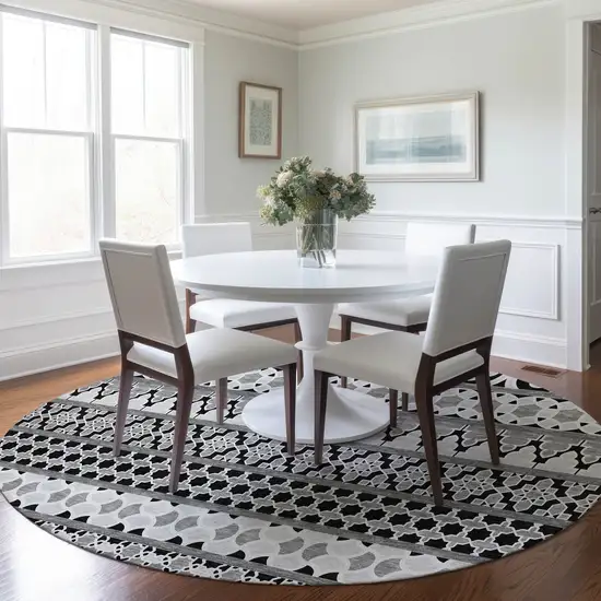 8' Black Gray And Ivory Round Quatrefoil Washable Indoor Outdoor Area Rug Photo 7