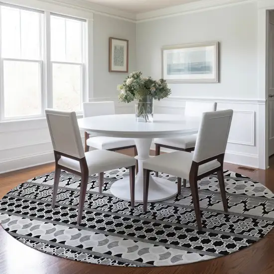 8' Black Gray And Ivory Round Quatrefoil Washable Indoor Outdoor Area Rug Photo 7