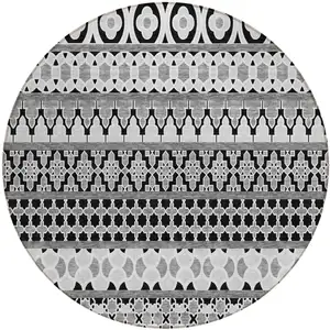 Photo of 8' Black Gray And Ivory Round Quatrefoil Washable Indoor Outdoor Area Rug