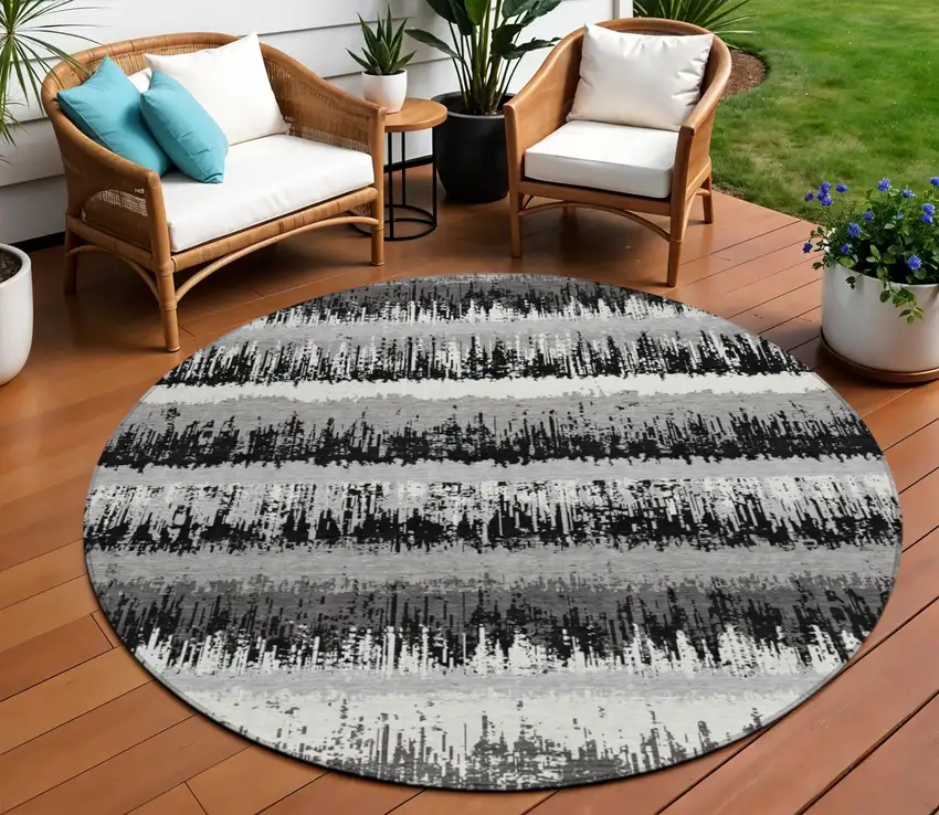 8' Black Gray And Ivory Round Striped Washable Indoor Outdoor Area Rug Photo 1