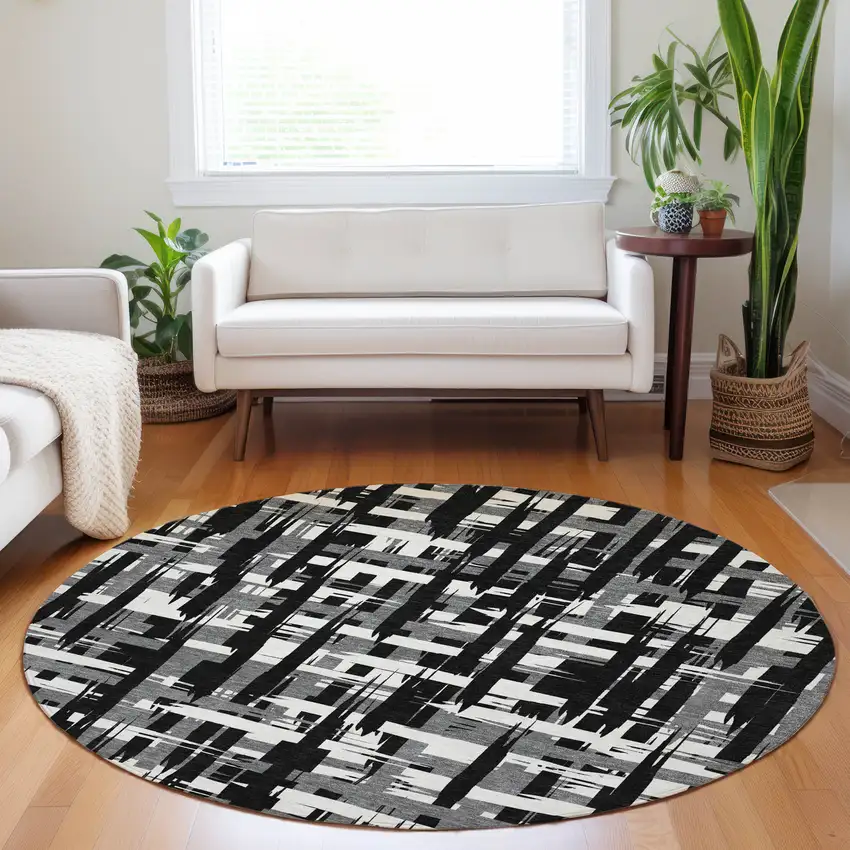 8' Black Gray And Ivory Round Striped Washable Indoor Outdoor Area Rug Photo 7