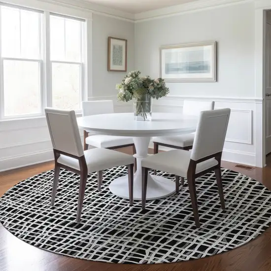 8' Black Gray And Ivory Round Striped Washable Indoor Outdoor Area Rug Photo 8