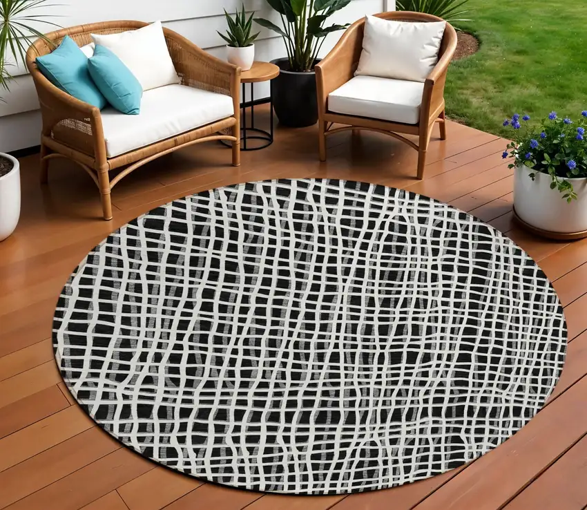 8' Black Gray And Ivory Round Striped Washable Indoor Outdoor Area Rug Photo 1