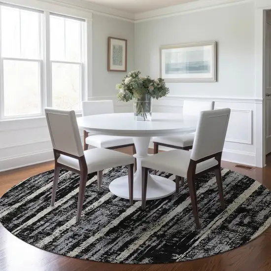 8' Black Gray And Ivory Round Striped Washable Indoor Outdoor Area Rug Photo 7