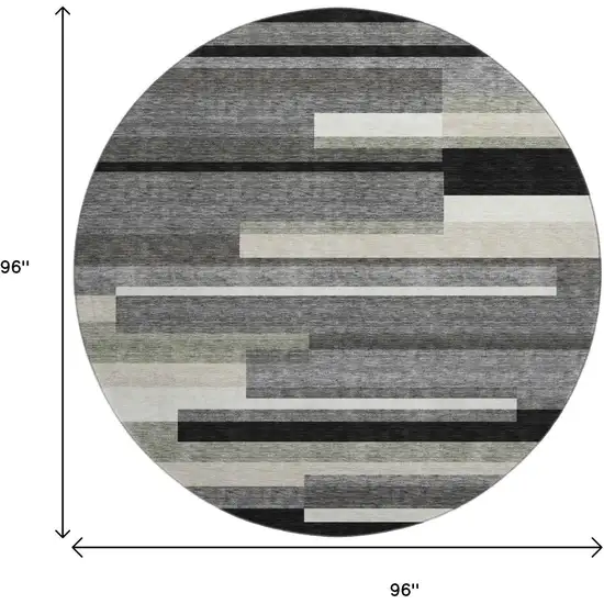8' Black Gray And Ivory Striped Washable Round Rug With UV Protection Photo 3