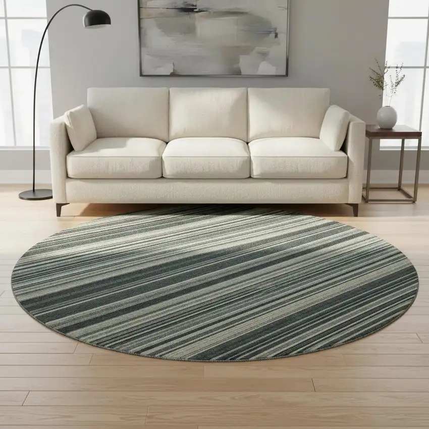 8' Black Gray And Ivory Striped Washable Round Rug With UV Protection Photo 2