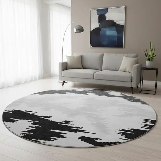 8' Black Gray And Silver Abstract Washable Round Rug With UV Protection Photo 2