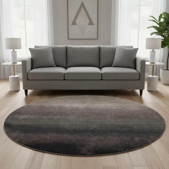 8' Black Gray And Silver Ombre Washable Round Rug With UV Protection Photo 2