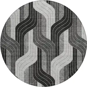 Photo of 8' Black Gray And Silver Round Striped Washable Indoor Outdoor Area Rug