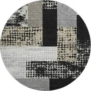 Photo of 8' Black Ivory And Beige Geometric Washable Round Rug With UV Protection