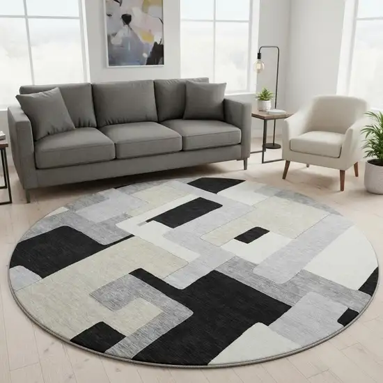8' Black Ivory And Beige Geometric Washable Round Rug With UV Protection Photo 2