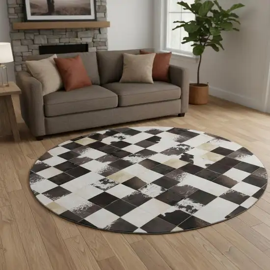 8' Black Ivory And Beige Patchwork Washable Round Rug With UV Protection Photo 1