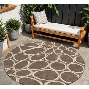 Photo of 8' Black Ivory And Beige Round Abstract Washable Indoor Outdoor Area Rug