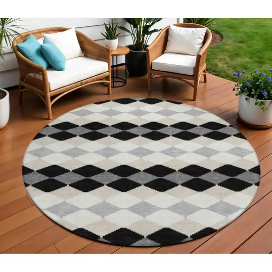 8' Black Ivory And Beige Round Geometric Washable Indoor Outdoor Area Rug Photo 1